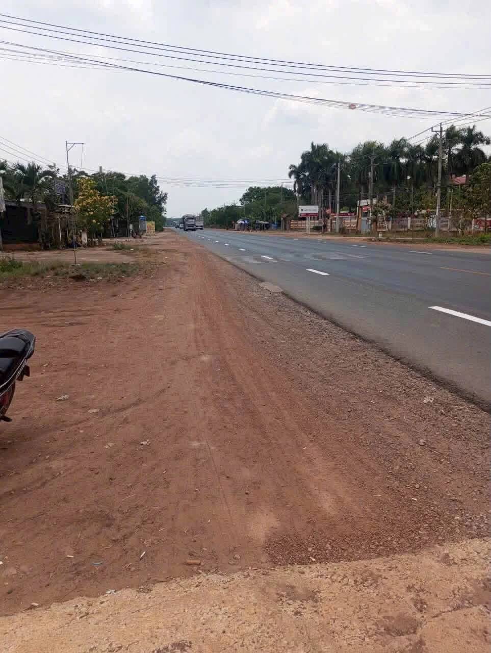 Bán đất mặt tiền Quốc Lộ 14 Tân Thành 12300m² Bình Chánh - Ảnh 1