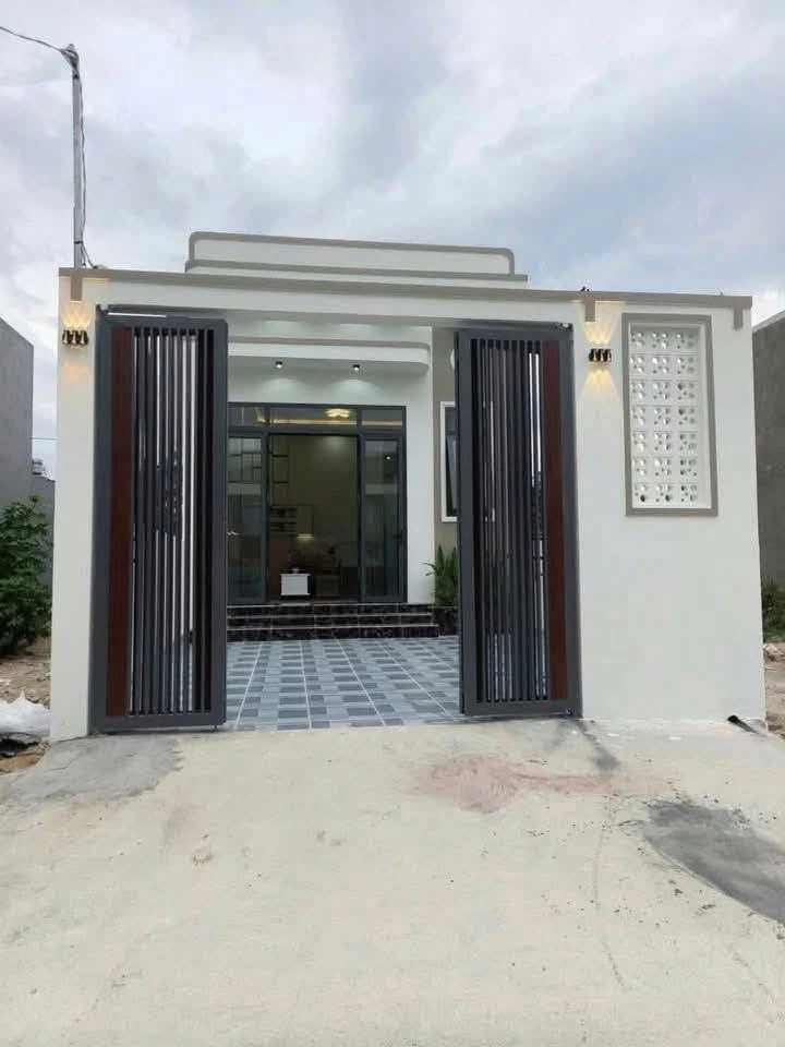 Bán nhà cấp 4 hai mặt tiền 125m² Bến Cát 1 tỷ 8 - Ảnh 1