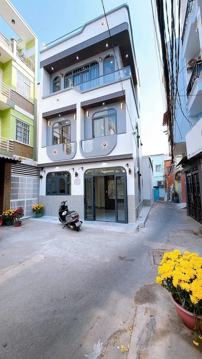 Bán nhà góc 2 mặt tiền 34m2, 1 trệt 2 lầu, 3PN, Quận 4, giá 9,3 tỷ - Ảnh 1