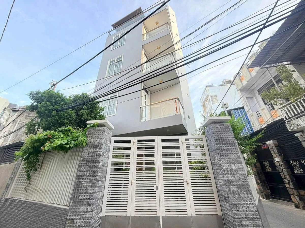 Bán nhà 1 trệt 4 tầng 126m² Nha Trang, gần biển - Ảnh 1