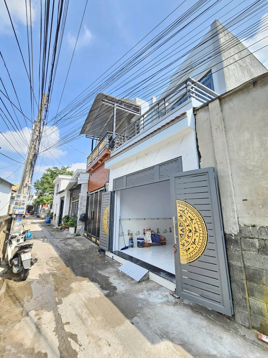 Bán nhà 1 trệt 1 lầu 66m² gần chợ Dĩ An, 4,2 tỷ - Ảnh 1