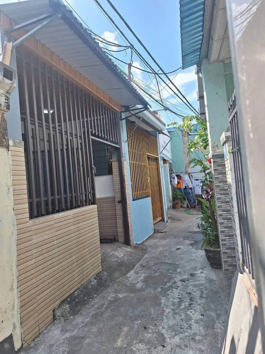 Bán nhà gác lửng 55m2 3 phòng ngủ Quận 1, gần Bến xe Ngã Ba Huế - Ảnh 1