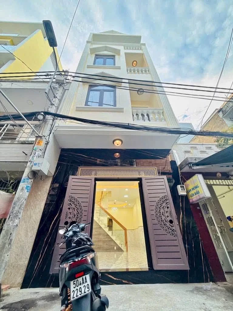 Bán nhà 4 tầng 40m² mặt tiền Quận 4, 12,4 tỷ - Ảnh 1
