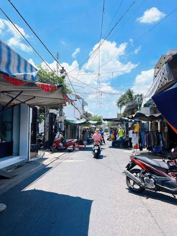 Bán nhà 1 lầu 1 trệt 140m² mặt tiền chợ, Long Bình, Đồng Nai