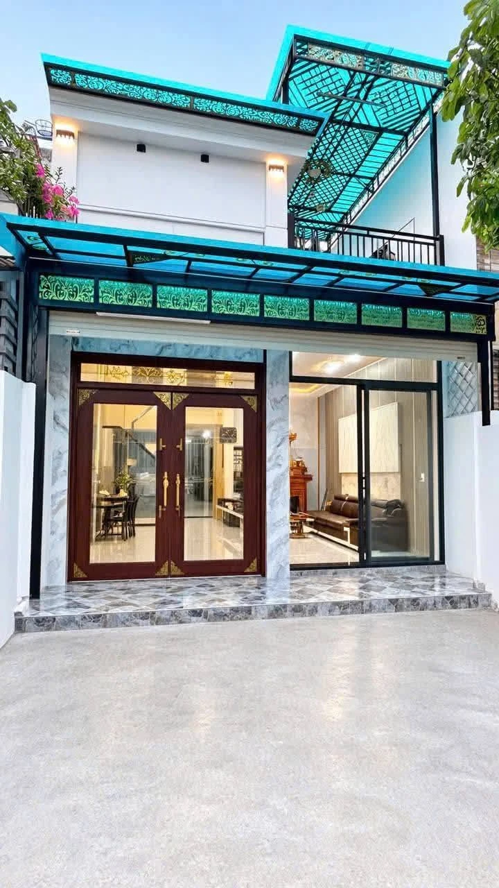 Bán nhà sổ hồng riêng 60m2, 1 trệt 1 lầu 3PN đường Nguyễn Thị Khắp, Dĩ An, Bình Dương - Ảnh 1