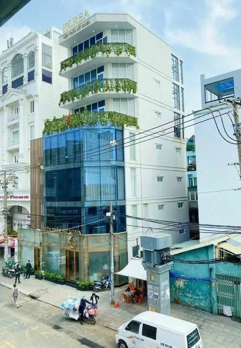 Bán tòa nhà góc 2 mặt tiền 120m2 Trần Nhật Duật Quận 1 - Ảnh 1