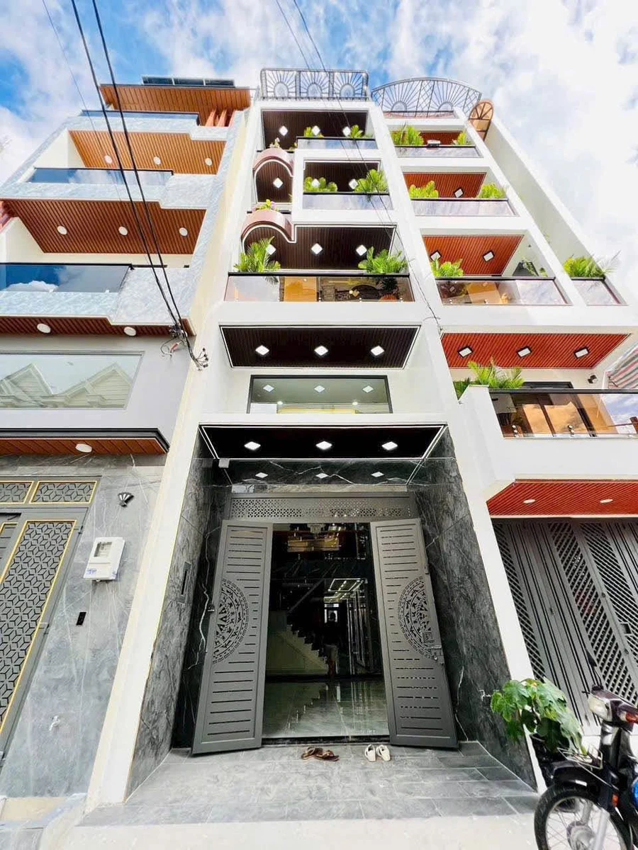 Nhà phố 4PN Tân Chánh Hiệp, Q.12, 97.7m², 9 tỷ 490 triệu - Ảnh 1