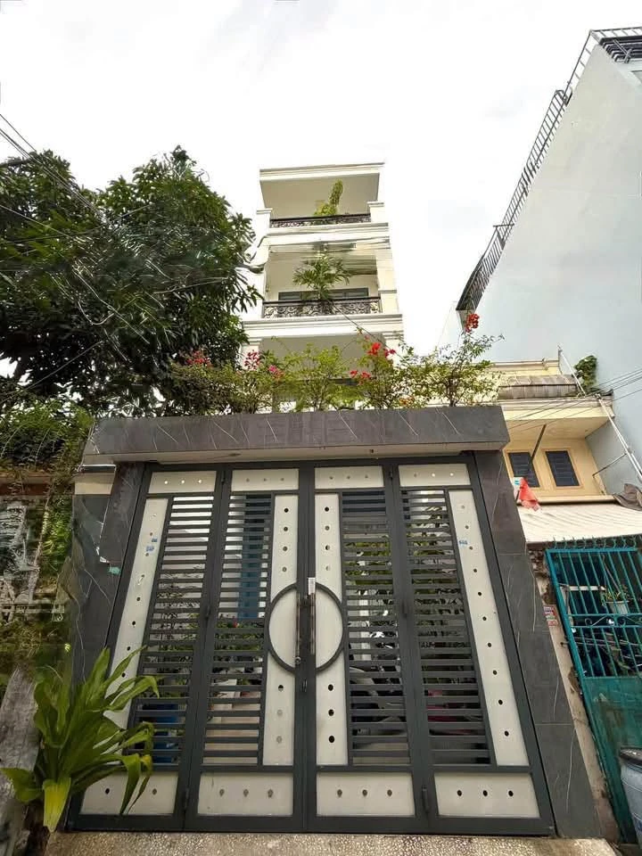 Bán nhà hẻm xe hơi 4 tầng 4x23m Lê Văn Quới, Bình Tân, giá 8,39 tỷ - Ảnh 1