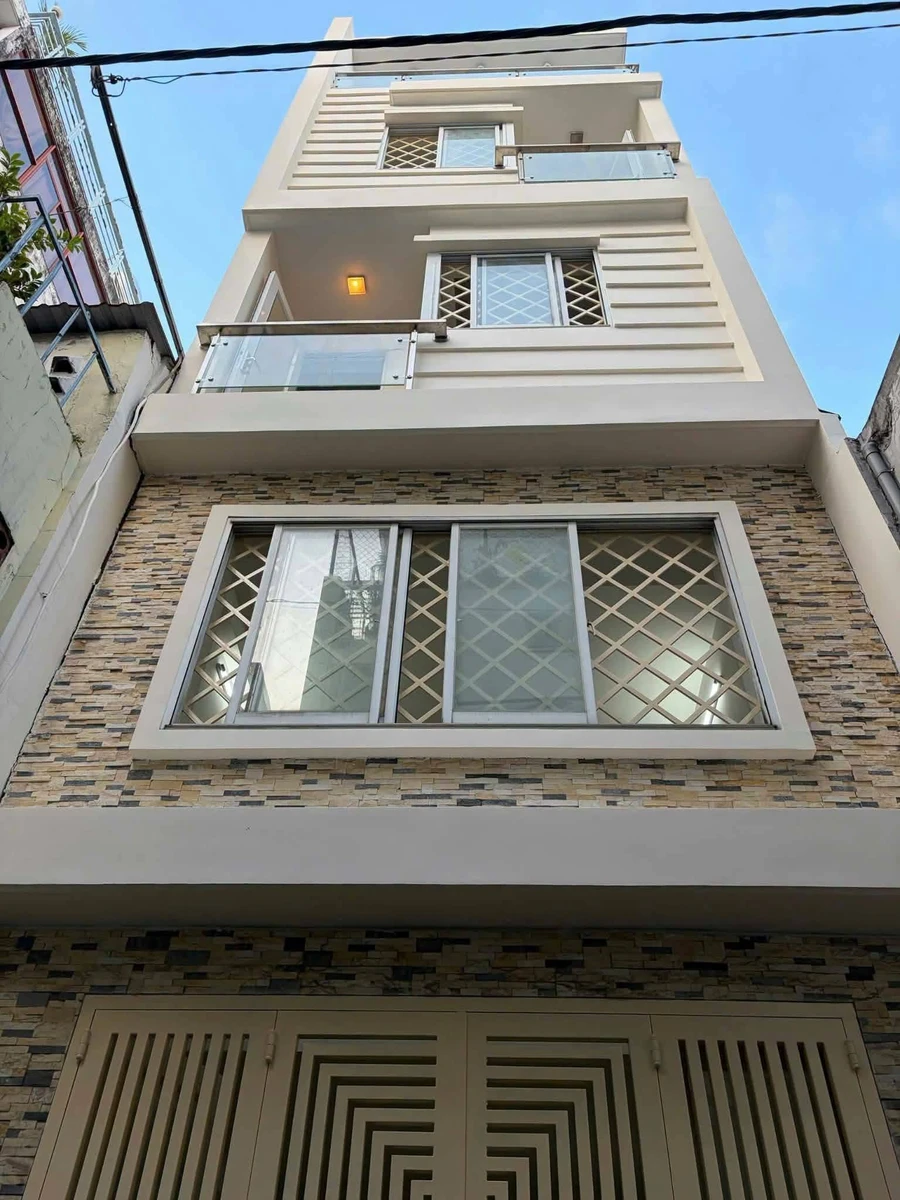 Cho thuê nhà phố 2PN, 32m² Tân Định, Quận 1 - Ảnh 1