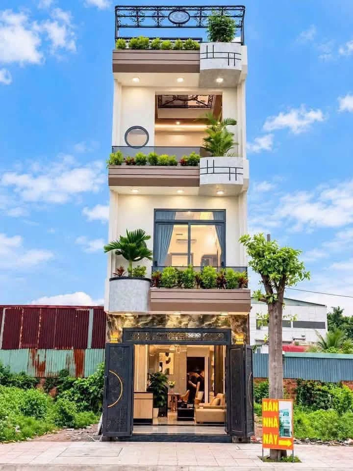 Bán nhà 1 trệt 2 lầu 4x16 (64m2) 4PN 4WC tặng full nội thất tại Thuận An, Bình Dương - Ảnh 1