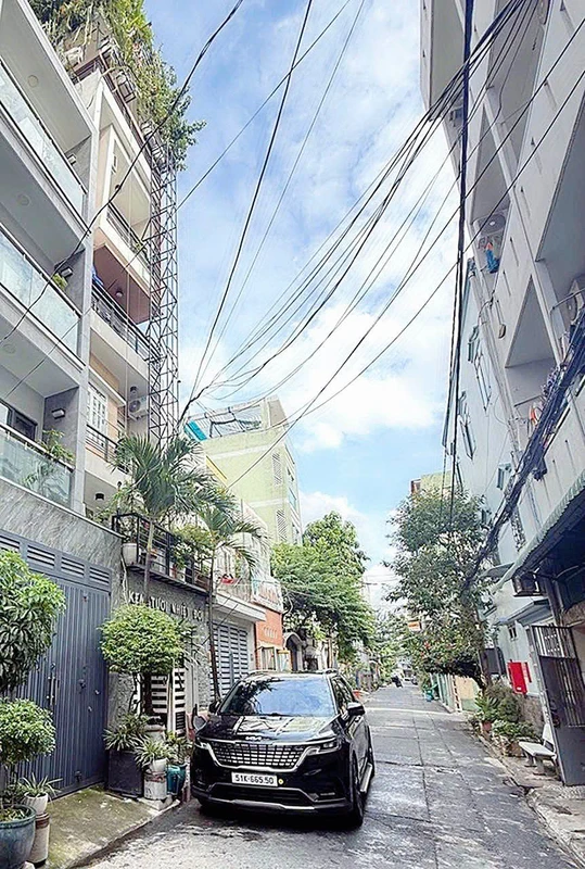 Bán nhà mặt tiền hẻm 8m đường Văn Chung, 80m², 4PN, gần ga T3, Tân Bình