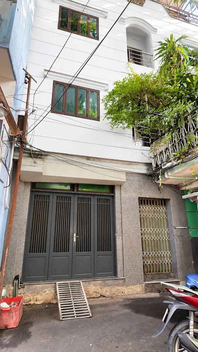Bán nhà 4 tầng 4PN 40m² đường Lê Quang Định Tân Bình 6,98 tỷ - Ảnh 1