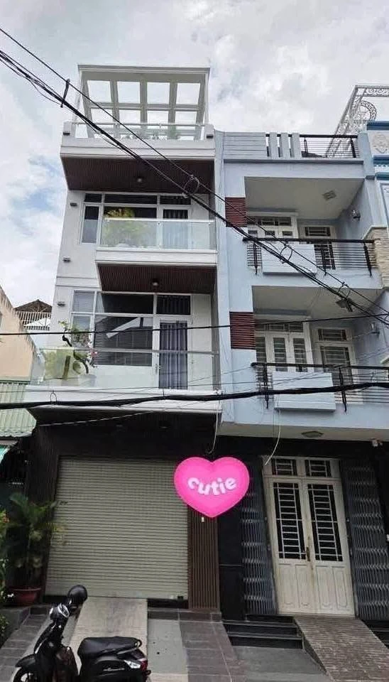Bán nhà mặt tiền 4x18m 1 trệt 2 lầu sân thượng khu Bình Phú, giá hơn 12 tỷ - Ảnh 1