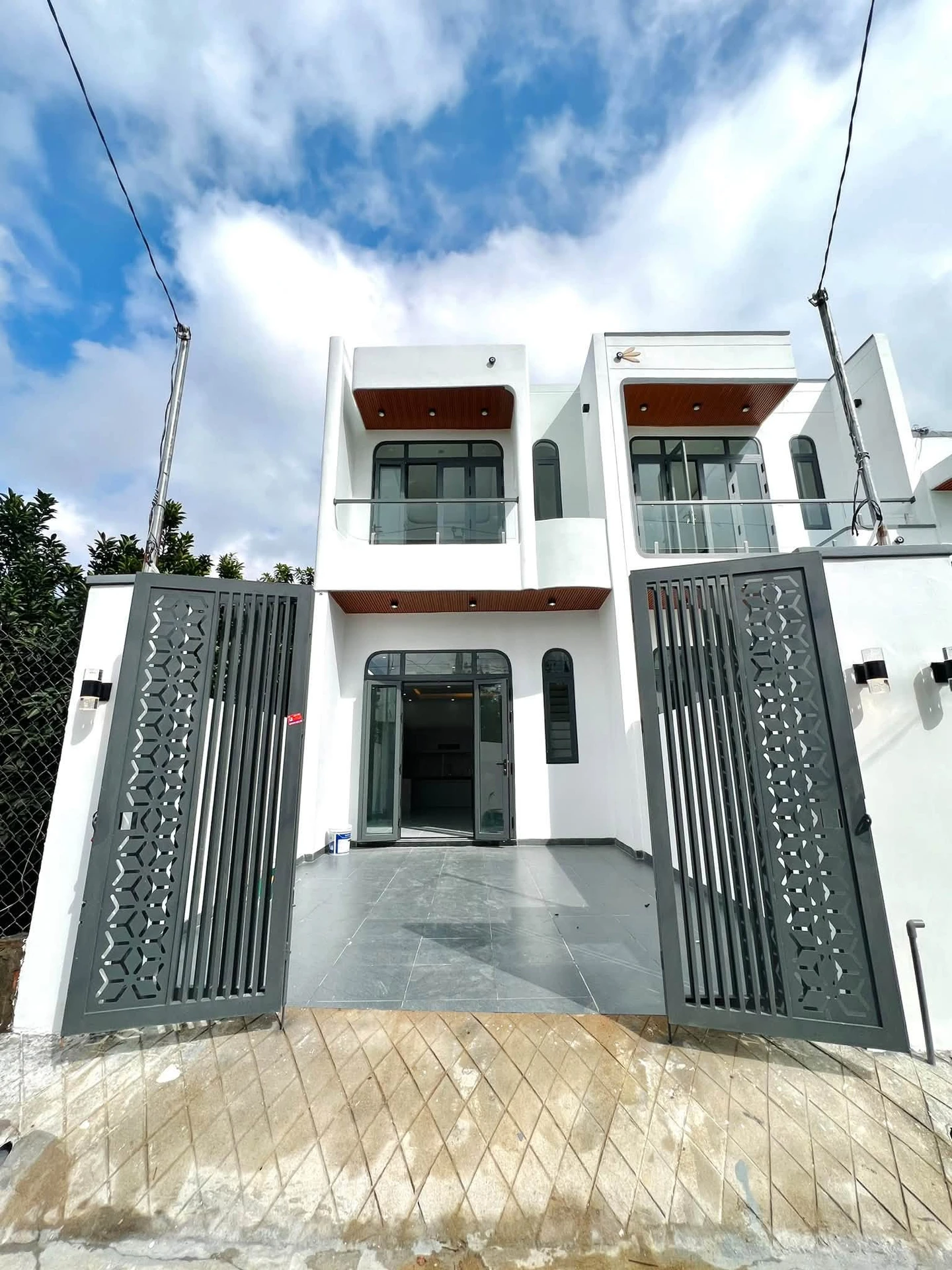 Bán nhà lầu 2 mặt tiền 100m² Tân Triều 2 tỷ - Ảnh 1