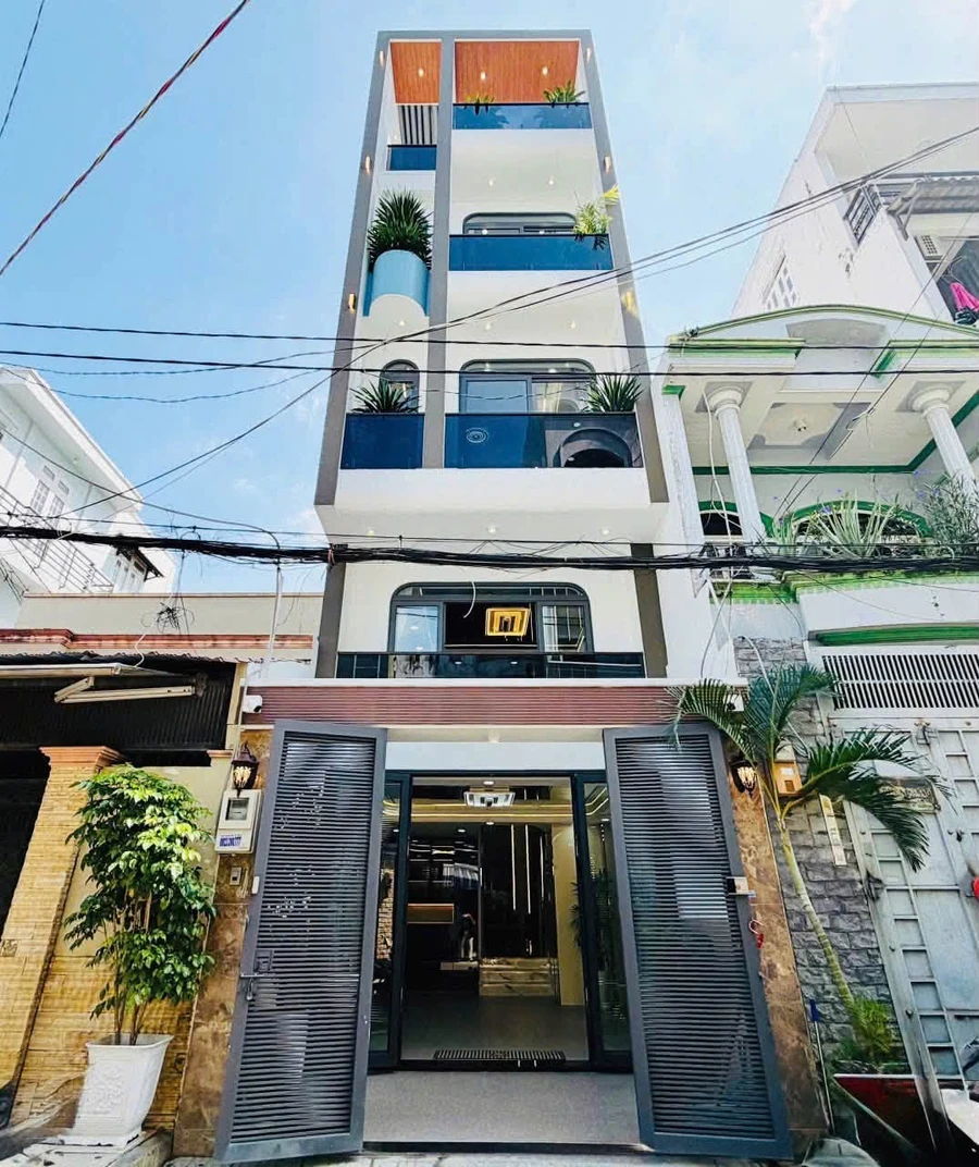 Bán nhà hẻm xe hơi Lê Văn Thọ, Gò Vấp, 4x14m, 5 tầng, thang máy, 10,9 tỷ - Ảnh 1