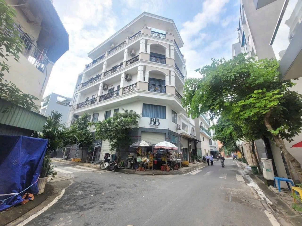 Bán nhà CHDV góc 2 mặt tiền hẻm 8m Tân Kỳ Tân Quý, 5 tầng, 77m2, giá 8,8 tỷ - Ảnh 1
