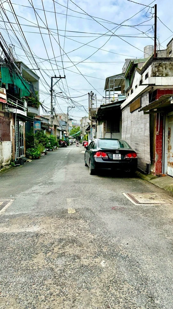 Bán đất thổ cư 100m2 sổ hồng riêng gần chợ Trung Chánh, Quận 12 - Ảnh 1