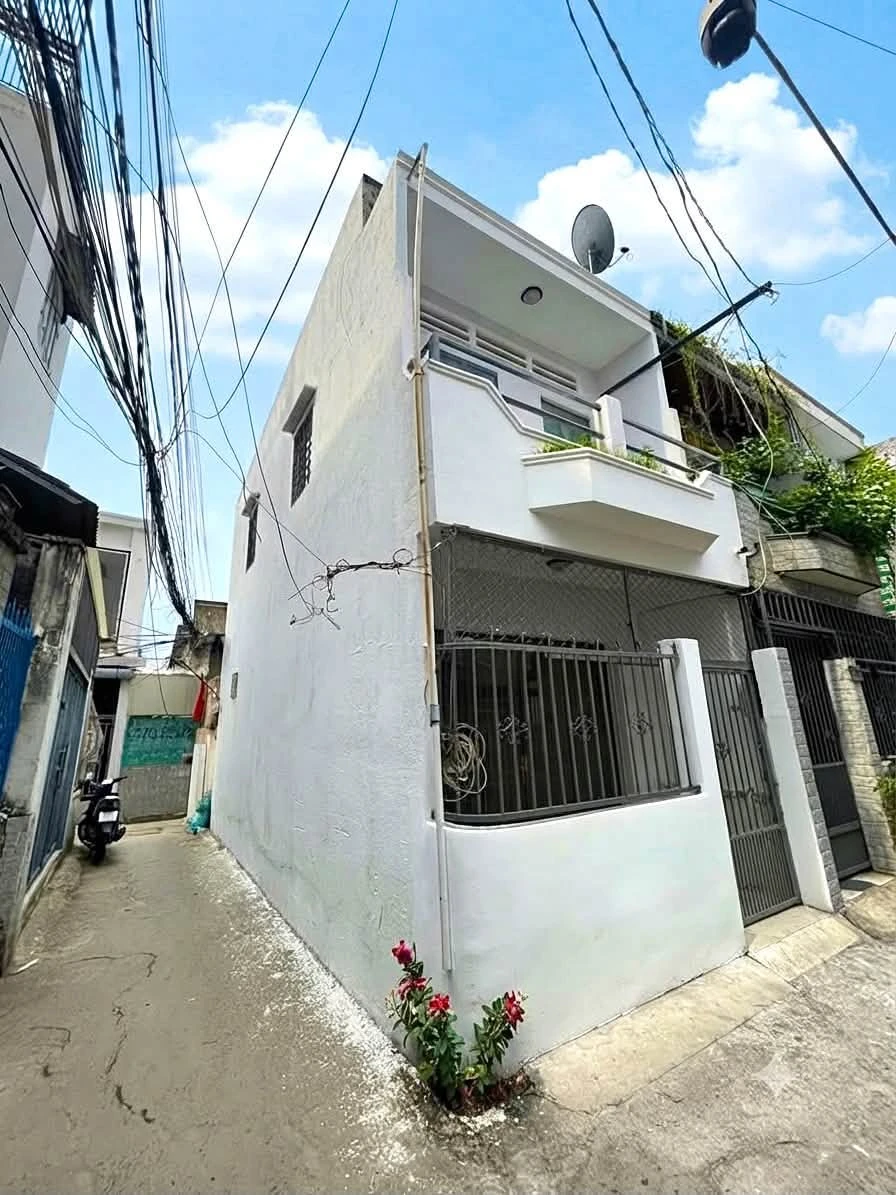 Bán nhà lô góc 2 tầng 28m² 2PN Quận 7 ngay KCX Tân Thuận 3.35 tỷ - Ảnh 1