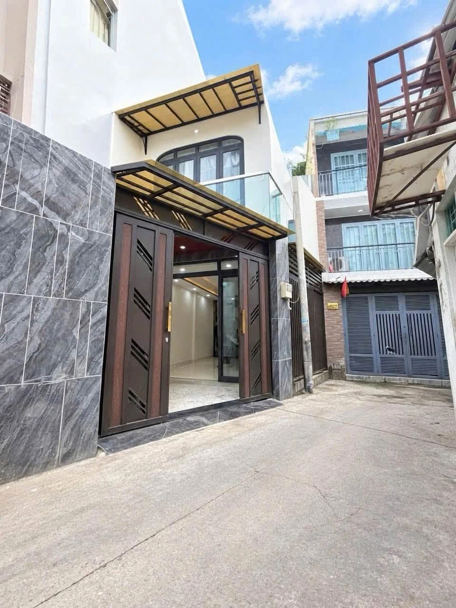 Bán nhà 1 trệt 1 lầu 70m² gần chợ Xóm Chiếu, Quận 4, giá 6,839 tỷ - Ảnh 1