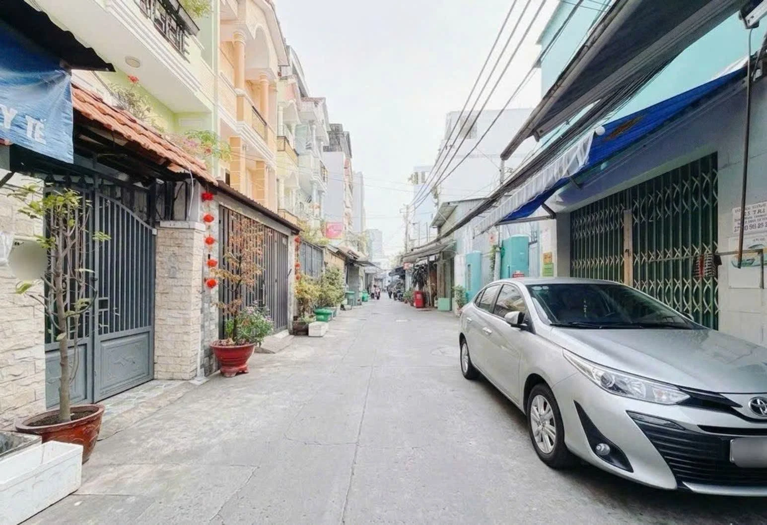 Bán nhà hẻm ô tô 4 tầng 100m² Quận 7 - Ảnh 1