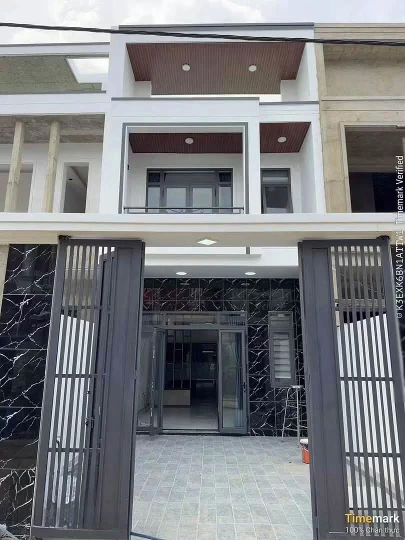 Bán nhà phố 100m2, 3PN, sổ hồng riêng, đường ĐX 07 Tân Vĩnh Hiệp - Ảnh 1