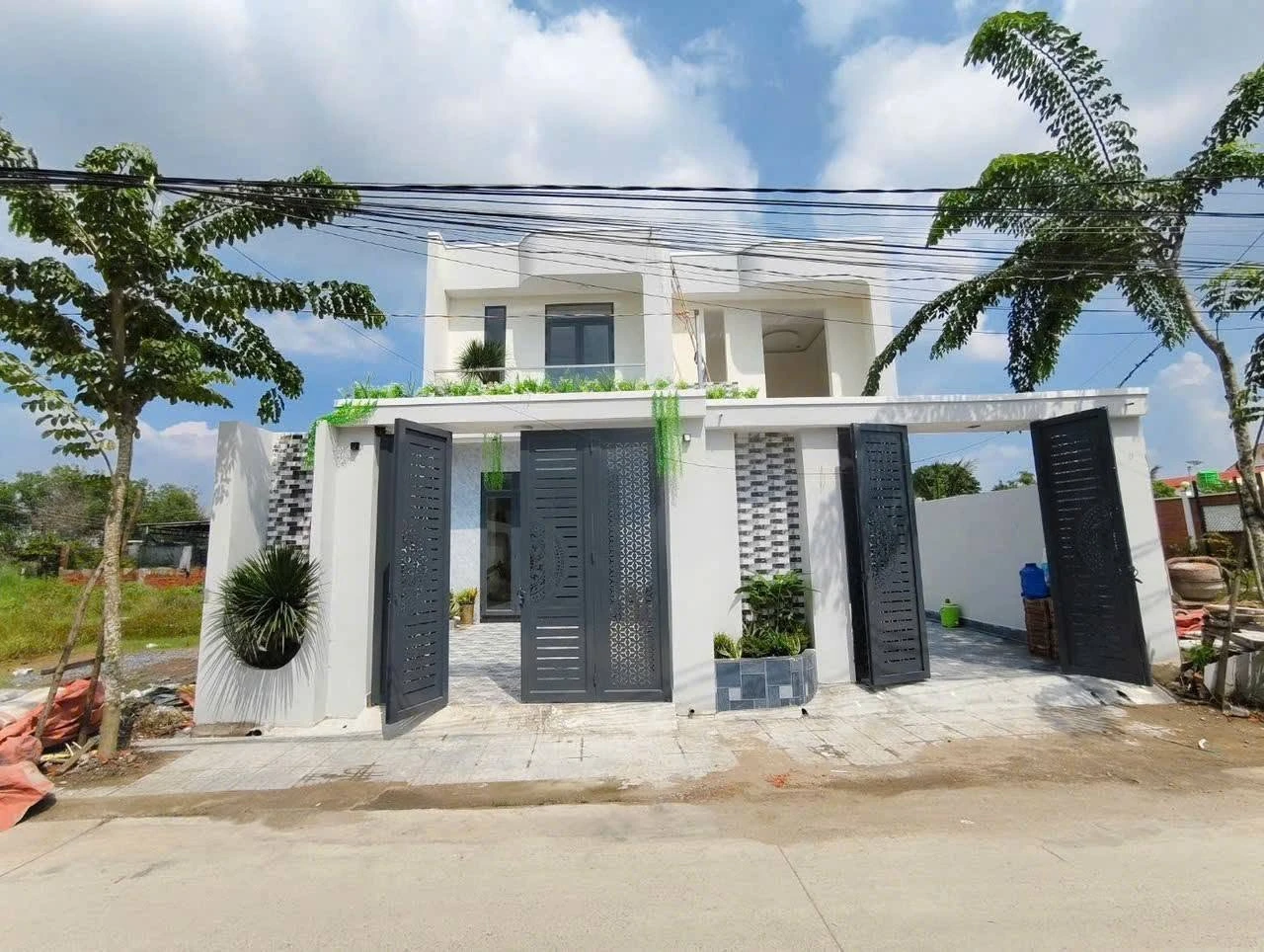 Nhà phố 5x28.5m 3PN 2.55 tỷ có hồ bơi Hóc Môn - Ảnh 1
