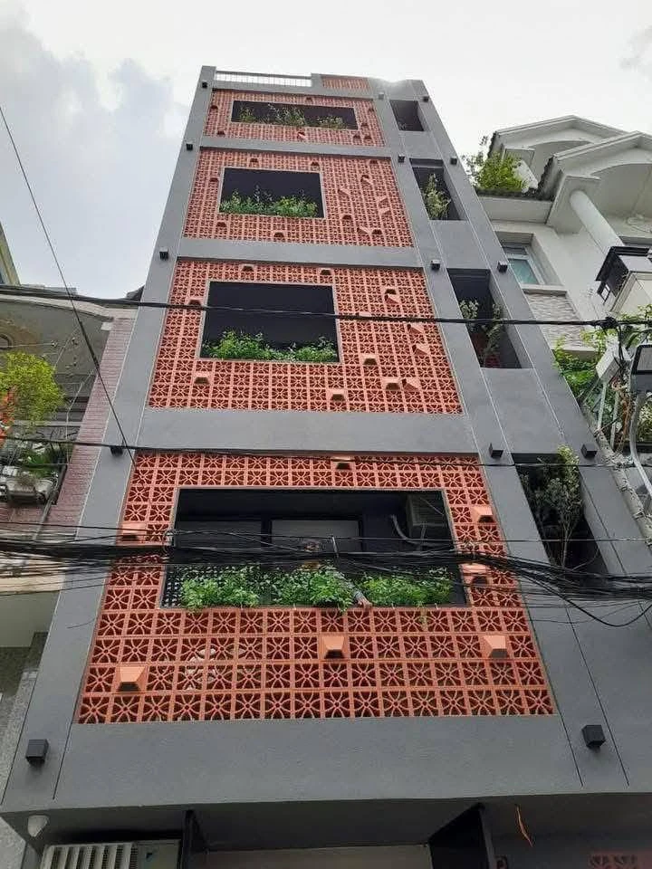 Bán tòa nhà 5 tầng thang máy 76m2 10 căn CHDV đường Nguyễn Trãi, Quận 1, giá 30 tỷ - Ảnh 1