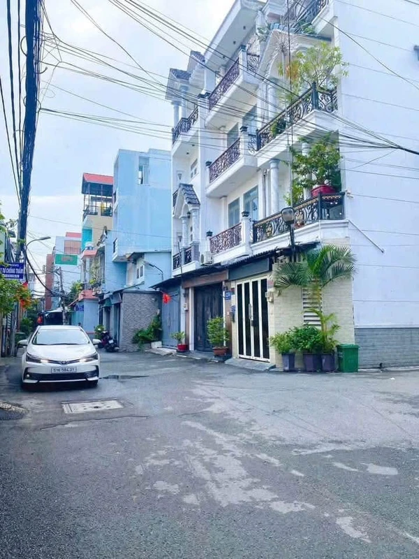 Bán nhà hẻm xe hơi góc 2 mặt tiền Quang Trung, 38,3m2, 4PN, 6,6 tỷ, Gò Vấp