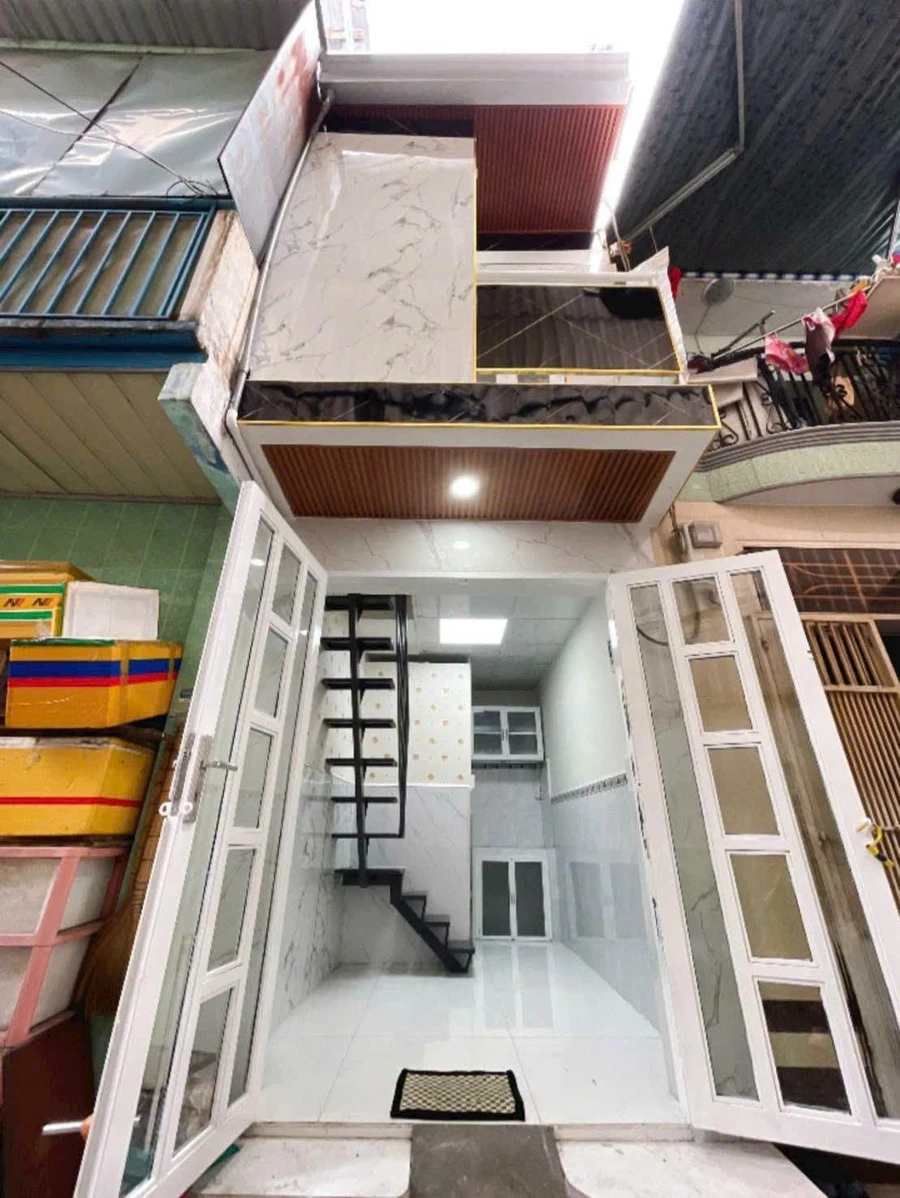 Bán nhà mới 1 trệt 1 lầu 1PN Quận 4, 1 tỷ 450 triệu - Ảnh 1