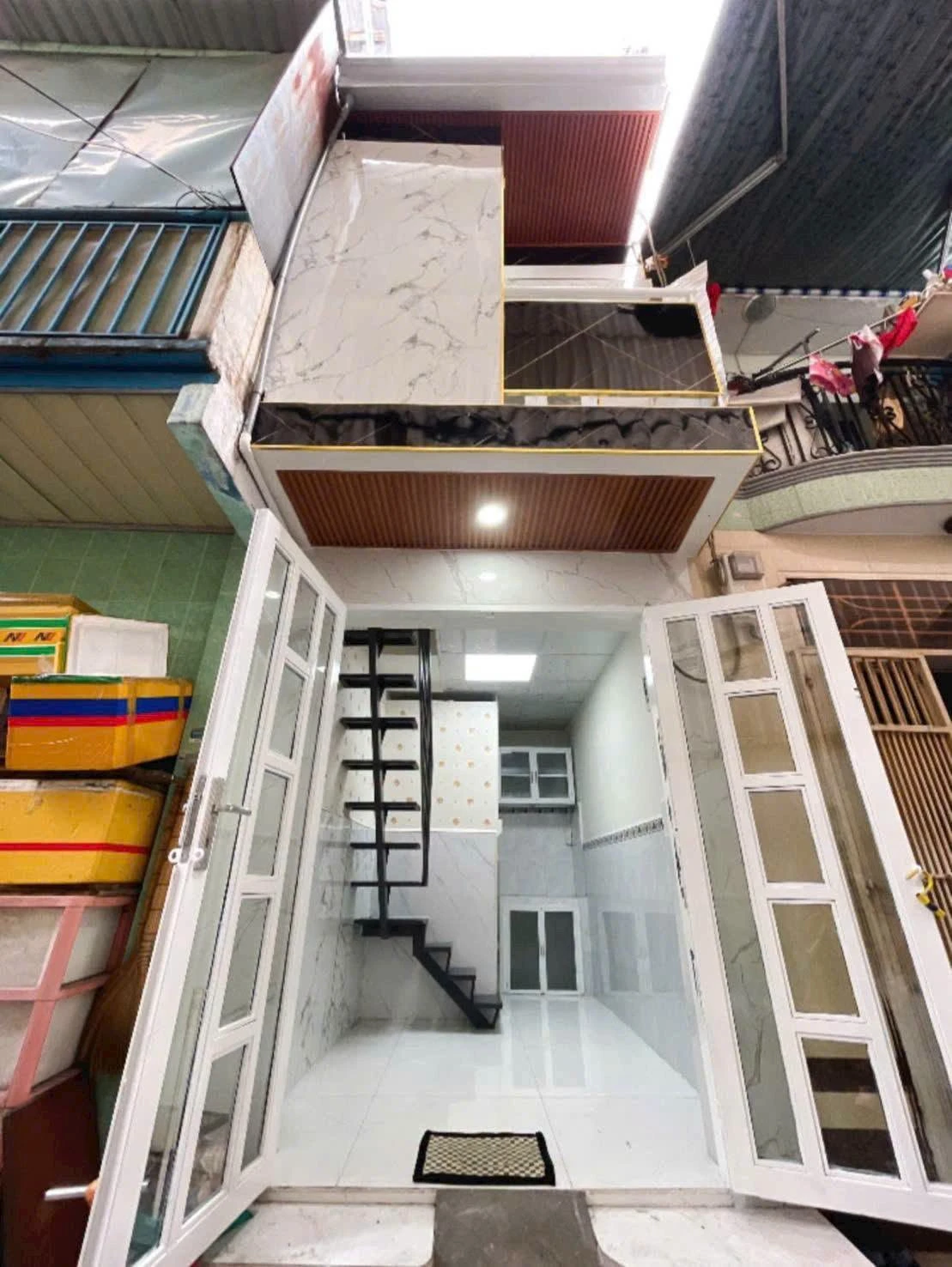 Bán nhà mới 1 trệt 1 lầu 1PN Quận 4, 1 tỷ 450 triệu - Ảnh 1