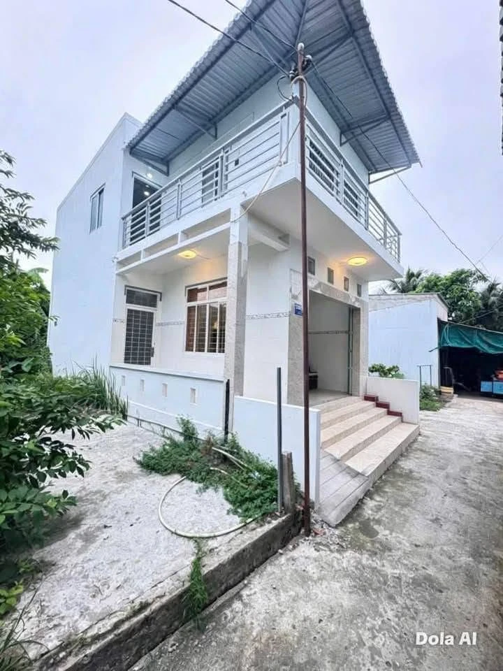 Bán nhà 1 trệt 1 lầu đối diện Chợ Chùa Phú Tân 136m² - Ảnh 1