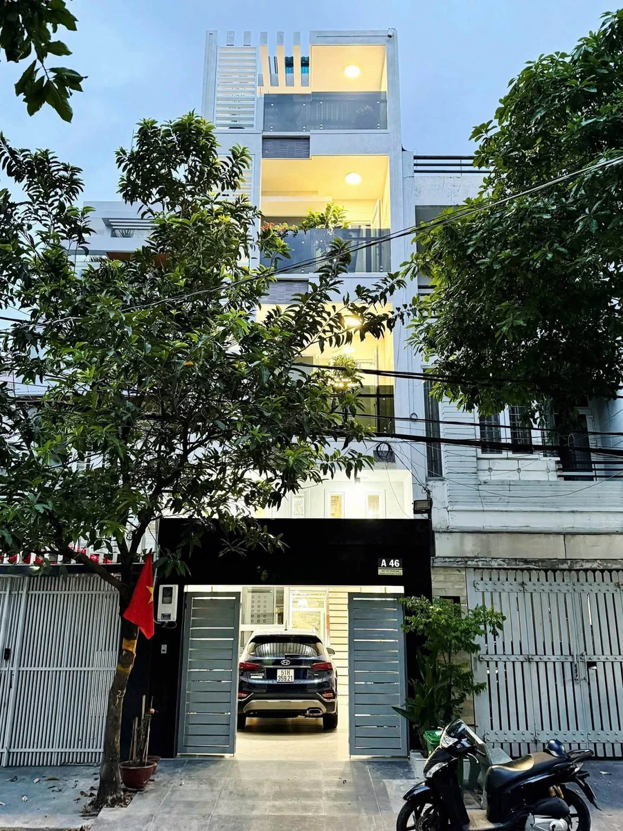 Bán nhà 19,5 tỷ mặt tiền Tân Thuận, 4 lầu 80m² - Ảnh 1