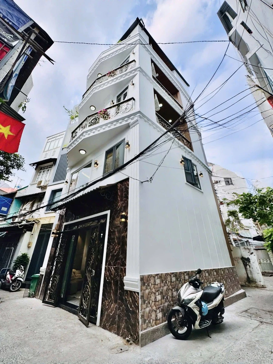 Bán nhà 4 phòng ngủ 38m2 Phan Xích Long, Quận 1 - Ảnh 1